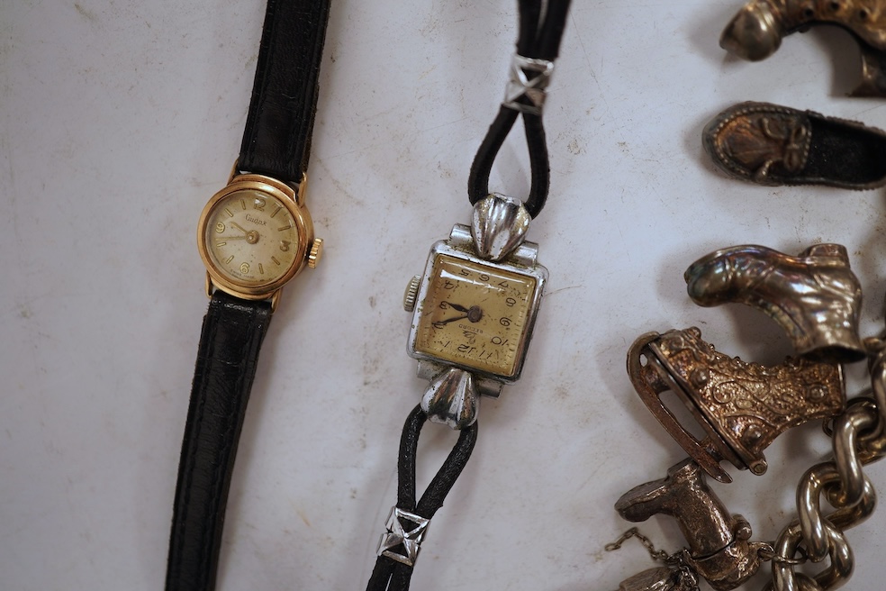 A white metal hunter keywind pocket watch, with Roman dial and subsidiary seconds, two silver charm bracelets and sundry items including jewellery and a silver sovereign case.